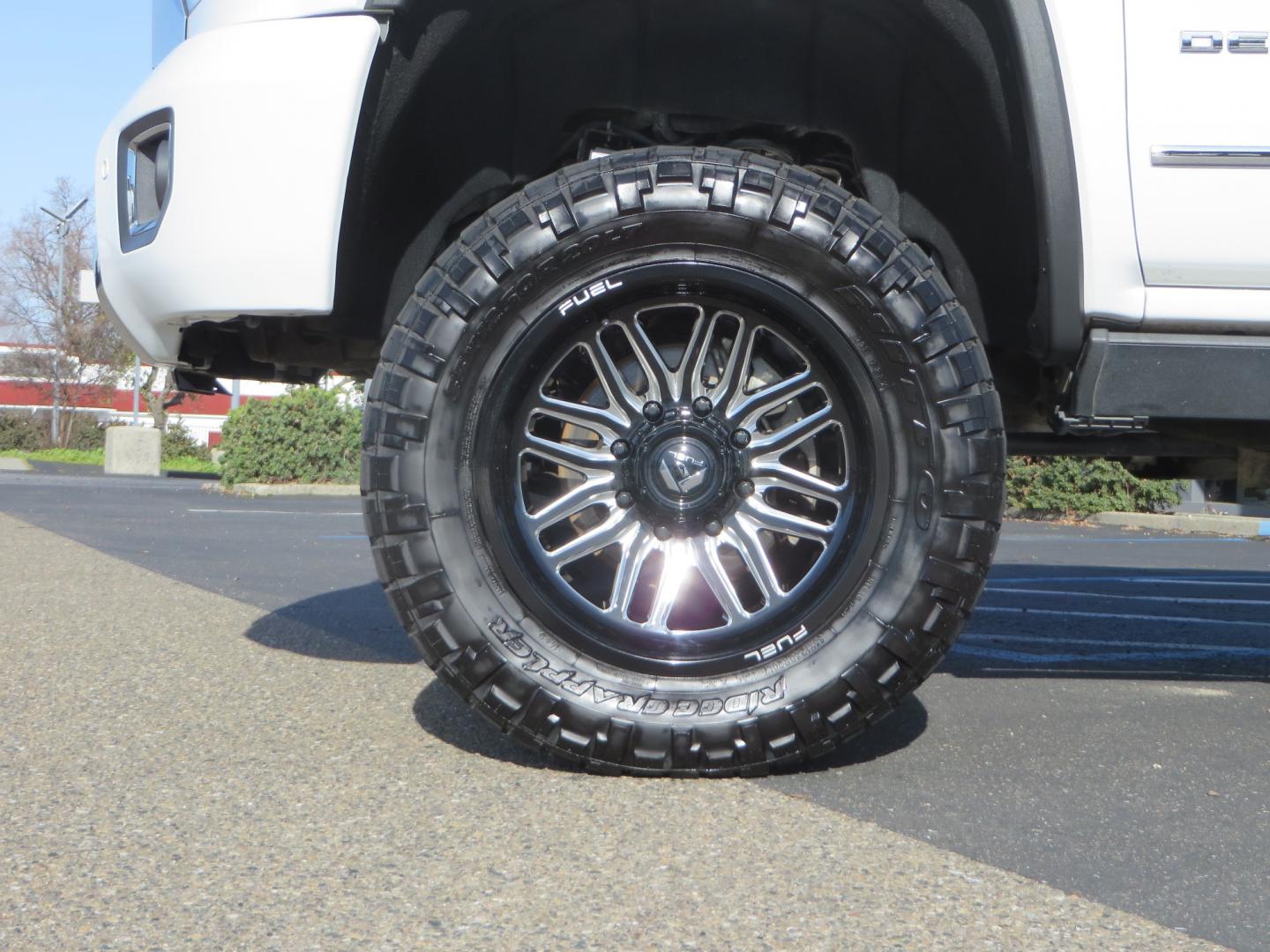 2015 White GMC Sierra 2500 HD Crew Cab Denali (1GT120E88FF) with an V8 Turbo Dsl 6.6L engine, Auto 6-Spd Allison OD transmission, located at 2630 Grass Valley Highway, Auburn, CA, 95603, (530) 508-5100, 38.937893, -121.095482 - 2015 GMC Denali 2500 6.6L Duramax Diesel. Cognito 4-6" lift kit, Cognito traction bars, Cognito idler and pitman support, Kryptonite upper control arms, Fox remote reservoir shocks, Amp power steps, Fuel Offroad wheels, Nitto Ridge Grappler tires, Alpine Stereo Firestone ride rite air bags, Transfer - Photo#8